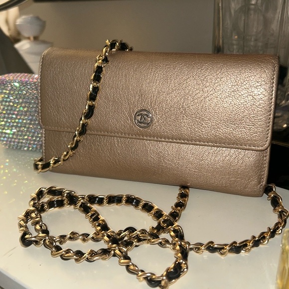 CHANEL Handbags - Chanel W/ COA Soft Leather Trifold metallic wallet in Gold